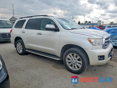 Czwarte zdjęcie samochodu z boku: 2014 TOYOTA SEQUOIA PLATINUM VIN:5TDDW5G16ES096331 - miniatura
