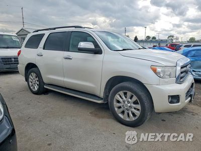 Czwarte zdjęcie samochodu z boku: 2014 TOYOTA SEQUOIA PLATINUM VIN:5TDDW5G16ES096331 - miniatura