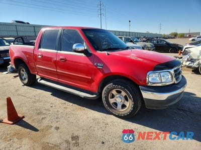 Czwarte zdjęcie samochodu z boku: 2001 FORD F150 SUPERCREW VIN:1FTRW07L61KE22625 - miniatura