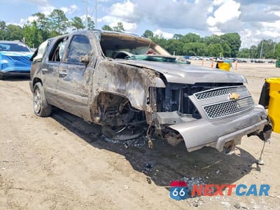 Czwarte zdjęcie samochodu z boku: 2013 CHEVROLET TAHOE C1500 LTZ VIN:1GNSCCE05DR120427 - miniatura