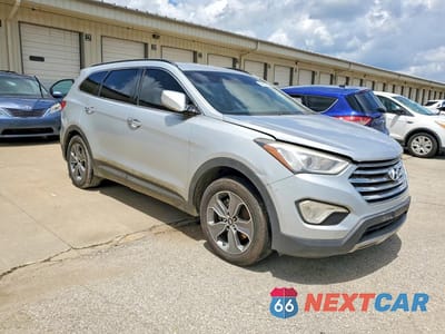 Czwarte zdjęcie samochodu z boku: 2016 HYUNDAI SANTA FE SE VIN:KM8SM4HF5GU143781 - miniatura