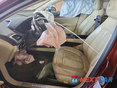 Zdjęcie 7 z 12 samochodu: 2015 LINCOLN MKZ VIN:3LN6L2J92FR614031 - miniatura