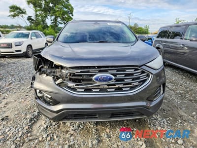 Piąte zdjęcie samochodu w środku: 2019 FORD EDGE TITANIUM VIN:2FMPK3K97KBC69096 - miniatura