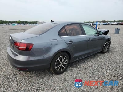 Trzecie zdjęcie samochodu z tyłu: 2017 VOLKSWAGEN JETTA SE VIN:3VWDB7AJ4HM331245 - miniatura