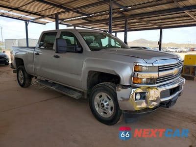 Czwarte zdjęcie samochodu z boku: 2015 CHEVROLET SILVERADO C2500 HEAVY DUTY LT VIN:1GC1CVE87FF195379 - miniatura
