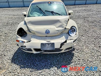 Zdjęcie 11 z 12 samochodu: 2006 VOLKSWAGEN NEW BEETLE CONVERTIBLE OPTION PACKAGE 2 VIN:3VWSF31Y36M317786 - miniatura