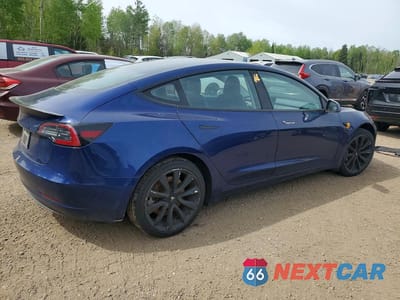 Trzecie zdjęcie samochodu z tyłu: 2018 TESLA MODEL 3 VIN:5YJ3E1EA5JF095826 - miniatura