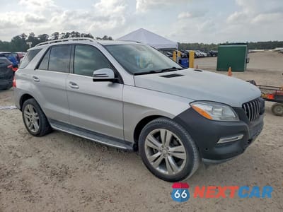 Czwarte zdjęcie samochodu z boku: 2015 MERCEDES-BENZ ML 350 VIN:4JGDA5JB3FA497183 - miniatura