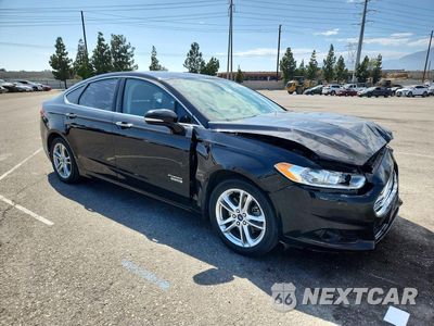 Czwarte zdjęcie samochodu z boku: 2016 FORD FUSION TITANIUM PHEV VIN:3FA6P0SU1GR229566 - miniatura