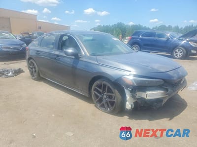 Czwarte zdjęcie samochodu z boku: 2023 HONDA CIVIC SPORT TOURING VIN:19XFL1H81PE010376 - miniatura