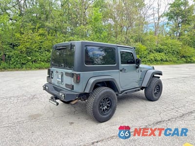 Czwarte zdjęcie samochodu z boku: 2015 JEEP WRANGLER SPORT VIN:1C4AJWAG8FL718516 - miniatura