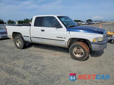 Czwarte zdjęcie samochodu z boku: 1999 DODGE RAM 1500 VIN:3B7HF13Z0XG122039 - miniatura