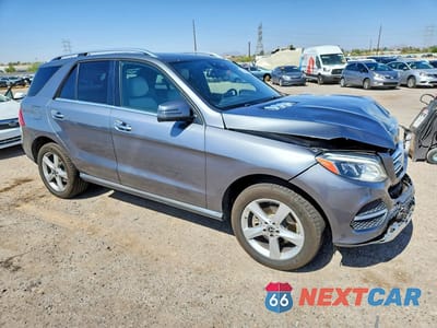 Czwarte zdjęcie samochodu z boku: 2018 MERCEDES-BENZ GLE 350 VIN:4JGDA5JB3JB041316 - miniatura