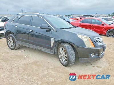 Czwarte zdjęcie samochodu z boku: 2014 CADILLAC SRX PREMIUM COLLECTION VIN:3GYFNDE36ES545765 - miniatura