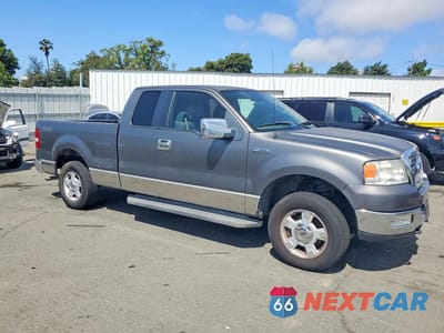 Czwarte zdjęcie samochodu z boku: 2005 FORD F150 VIN:1FTPX14595NC09883 - miniatura