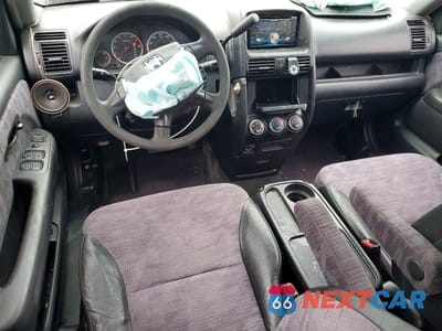 Zdjęcie 8 z 14 samochodu: 2003 HONDA CR-V LX VIN:JHLRD78413C019481 - miniatura
