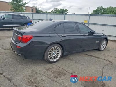 Trzecie zdjęcie samochodu z tyłu: 2014 BMW 750 XI VIN:WBAYB6C53ED224352 - miniatura