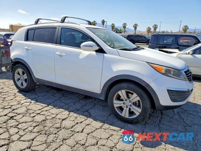 Czwarte zdjęcie samochodu z boku: 2013 KIA SPORTAGE LX VIN:KNDPB3A24D7373520 - miniatura