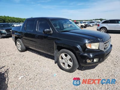Czwarte zdjęcie samochodu z boku: 2009 HONDA RIDGELINE RTL VIN:5FPYK165X9B105527 - miniatura