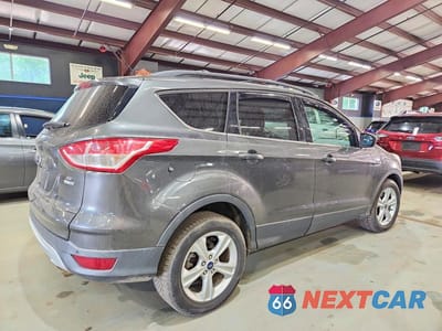 Trzecie zdjęcie samochodu z tyłu: 2015 FORD ESCAPE SE VIN:1FMCU9GX4FUA11766 - miniatura