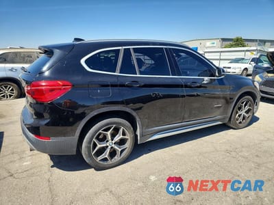 Trzecie zdjęcie samochodu z tyłu: 2018 BMW X1 XDRIVE28I VIN:WBXHT3C38J5K28093 - miniatura