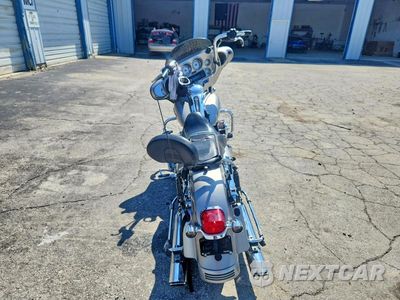 Czwarte zdjęcie samochodu z boku: 2009 HARLEY DAVIDSON FLHX VIN:1HD1KB4149Y624216 - miniatura
