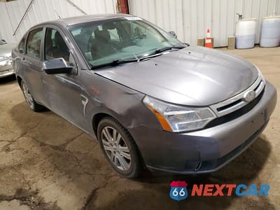 Czwarte zdjęcie samochodu z boku: 2009 FORD FOCUS SEL VIN:1FAHP37N79W225596 - miniatura