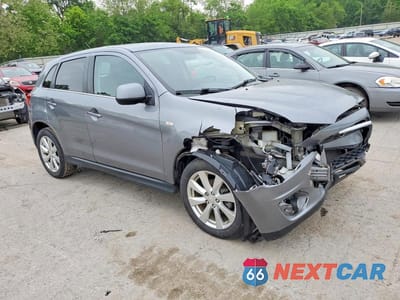Czwarte zdjęcie samochodu z boku: 2013 MITSUBISHI OUTLANDER SPORT SE VIN:4A4AR4AU1DE008659 - miniatura