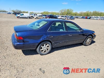 Trzecie zdjęcie samochodu z tyłu: 1999 TOYOTA CAMRY LE VIN:4T1BF22K0XU931663 - miniatura