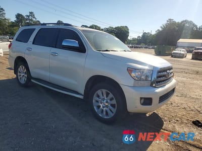 Czwarte zdjęcie samochodu z boku: 2012 TOYOTA SEQUOIA PLATINUM VIN:5TDYY5G15CS039983 - miniatura