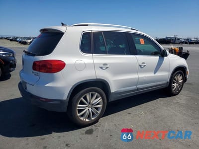 Trzecie zdjęcie samochodu z tyłu: 2013 VOLKSWAGEN TIGUAN S VIN:WVGBV3AXXDW601034 - miniatura