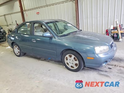 Czwarte zdjęcie samochodu z boku: 2003 HYUNDAI ELANTRA GLS VIN:KMHDN45D33U646664 - miniatura