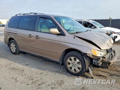 Czwarte zdjęcie samochodu z boku: 2004 HONDA ODYSSEY EX VIN:5FNRL18874B113188 - miniatura