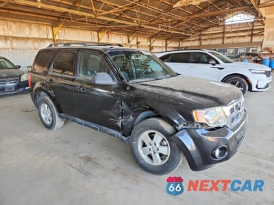 Czwarte zdjęcie samochodu z boku: 2010 FORD ESCAPE XLT VIN:1FMCU0DG7AKD40353 - miniatura