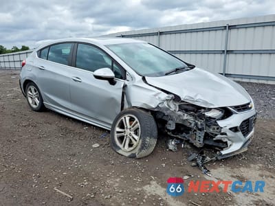 Czwarte zdjęcie samochodu z boku: 2017 CHEVROLET CRUZE LT VIN:3G1BE6SM3HS512247 - miniatura
