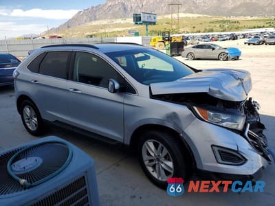Czwarte zdjęcie samochodu z boku: 2017 FORD EDGE SEL VIN:2FMPK4J93HBB04498 - miniatura