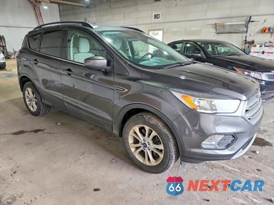 Czwarte zdjęcie samochodu z boku: 2018 FORD ESCAPE SE VIN:1FMCU9GD7JUC57967 - miniatura