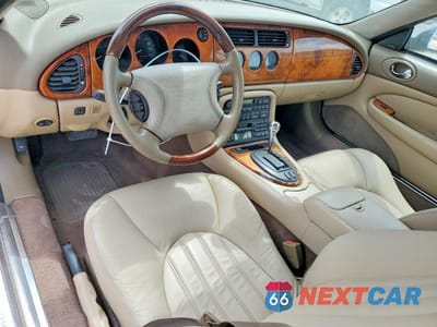 Zdjęcie 8 z 12 samochodu: 2000 JAGUAR XK8 VIN:SAJJA42C7YNA03402 - miniatura
