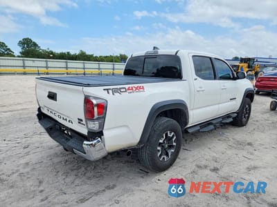 Trzecie zdjęcie samochodu z tyłu: 2021 TOYOTA TACOMA TRD OFF-ROAD VIN:3TMCZ5AN6MM451530 - miniatura