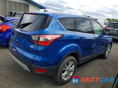 Trzecie zdjęcie samochodu z tyłu: 2017 FORD ESCAPE SE VIN:1FMCU9GD9HUE03814 - miniatura
