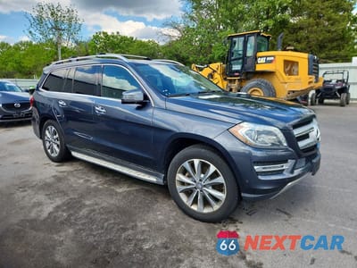 Czwarte zdjęcie samochodu z boku: 2015 MERCEDES-BENZ GL 450 4MATIC VIN:4JGDF6EE9FA477189 - miniatura