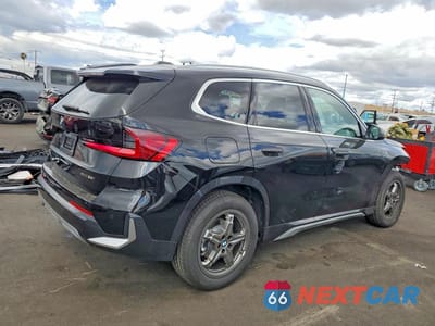 Trzecie zdjęcie samochodu z tyłu: 2026 BMW X1 XDRIVE28I VIN:WBX73EF08T5537302 - miniatura