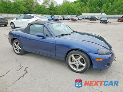 Czwarte zdjęcie samochodu z boku: 2003 MAZDA MX-5 MIATA BASE VIN:JM1NB353430304649 - miniatura
