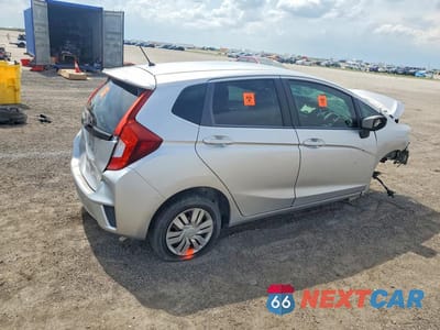Trzecie zdjęcie samochodu z tyłu: 2015 HONDA FIT LX VIN:3HGGK5H59FM751918 - miniatura