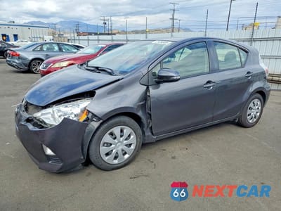 2014 TOYOTA PRIUS C THREE JTDKDTB38E1573803 - główne zdjęcie licytacji z USA - miniatura