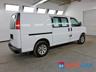Trzecie zdjęcie samochodu z tyłu: 2012 CHEVROLET EXPRESS G1500 VIN:1GCSGAFX8C1149429 - miniatura