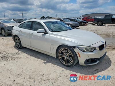 Czwarte zdjęcie samochodu z boku: 2016 BMW 428 I GRAN COUPE SULEV VIN:WBA4A9C51GG695212 - miniatura