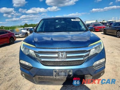 Piąte zdjęcie samochodu w środku: 2016 HONDA PILOT EXL VIN:5FNYF5H5XGB016278 - miniatura