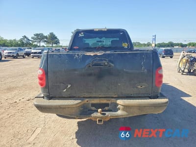 Zdjęcie 6 z 12 samochodu: 2003 FORD F150 VIN:1FTRX07253KC11407 - miniatura