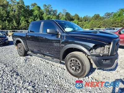 Czwarte zdjęcie samochodu z boku: 2015 RAM 1500 REBEL VIN:1C6RR7YT3FS785669 - miniatura